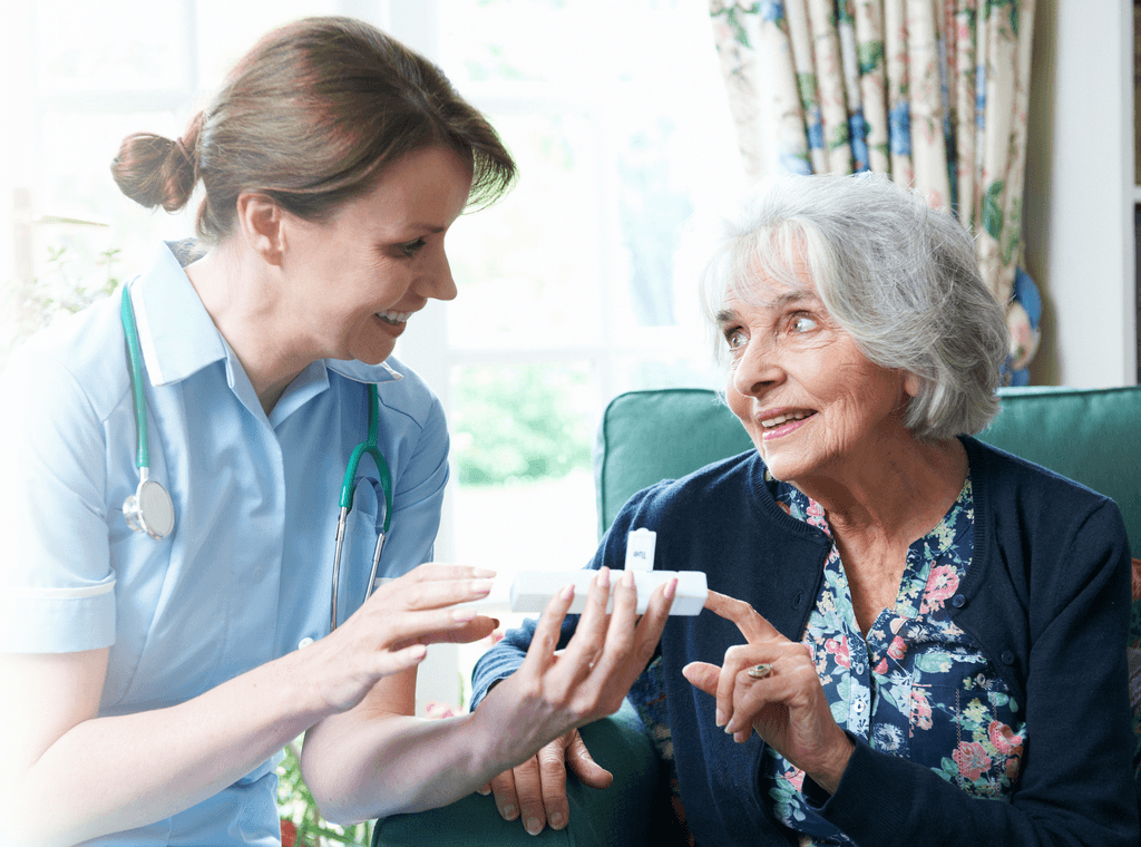 Elderly woman receiving home care