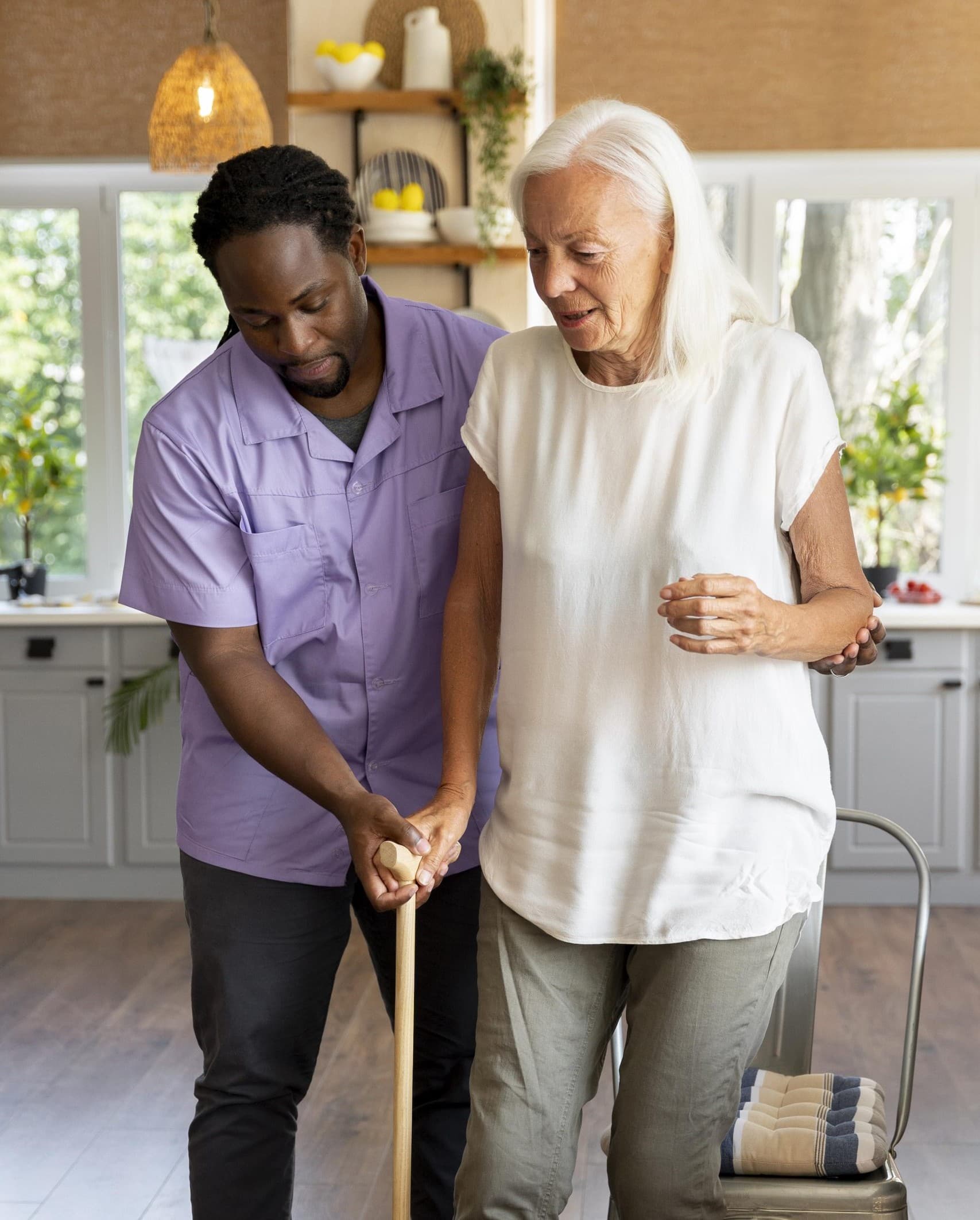 Home health aide assisting a New York family at home — S&A Unified Home Care's HHA, PCA, NHTD, TBI, and OPWDD programs.